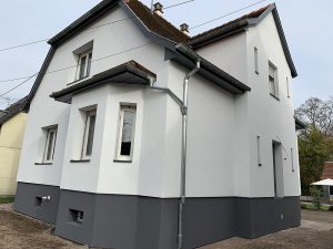 Chantier d'isolation extérieure avec ravalement de façade dans le 67.