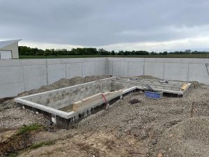 Chantier de construction de piscine, de local technique et une pool house dans le 67.