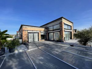 Chantier d'isolation extérieure, ravalement de façade et remplacement de gouttières dans le 67.