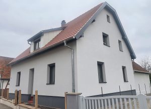Travaux d'isolation, ravalement de façade et zinguerie.