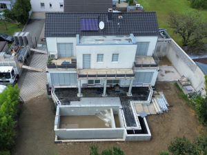 Construction d'une piscine à Kaltenhouse.