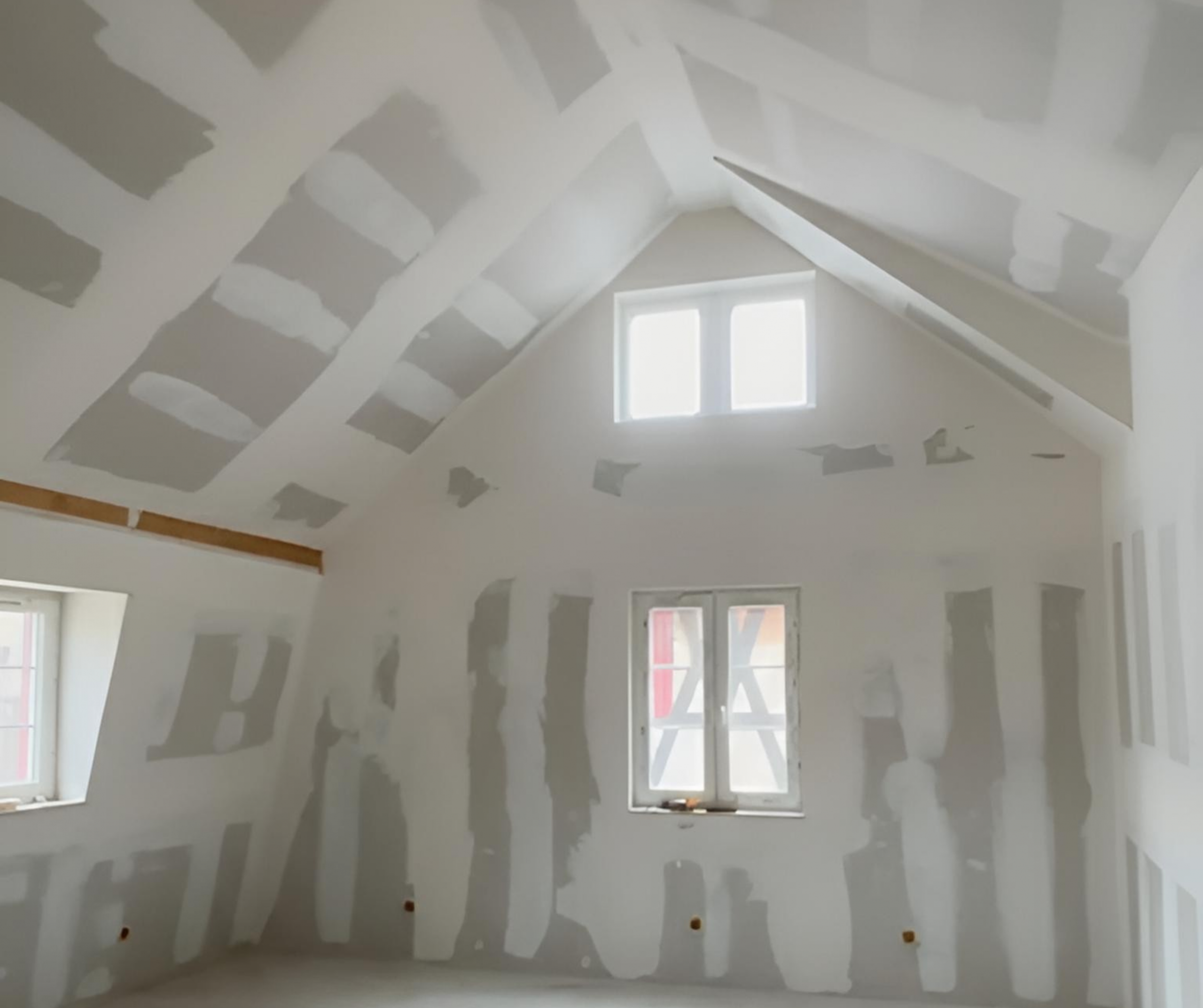 Maçonnerie entre colombages et plâtrerie intérieur.