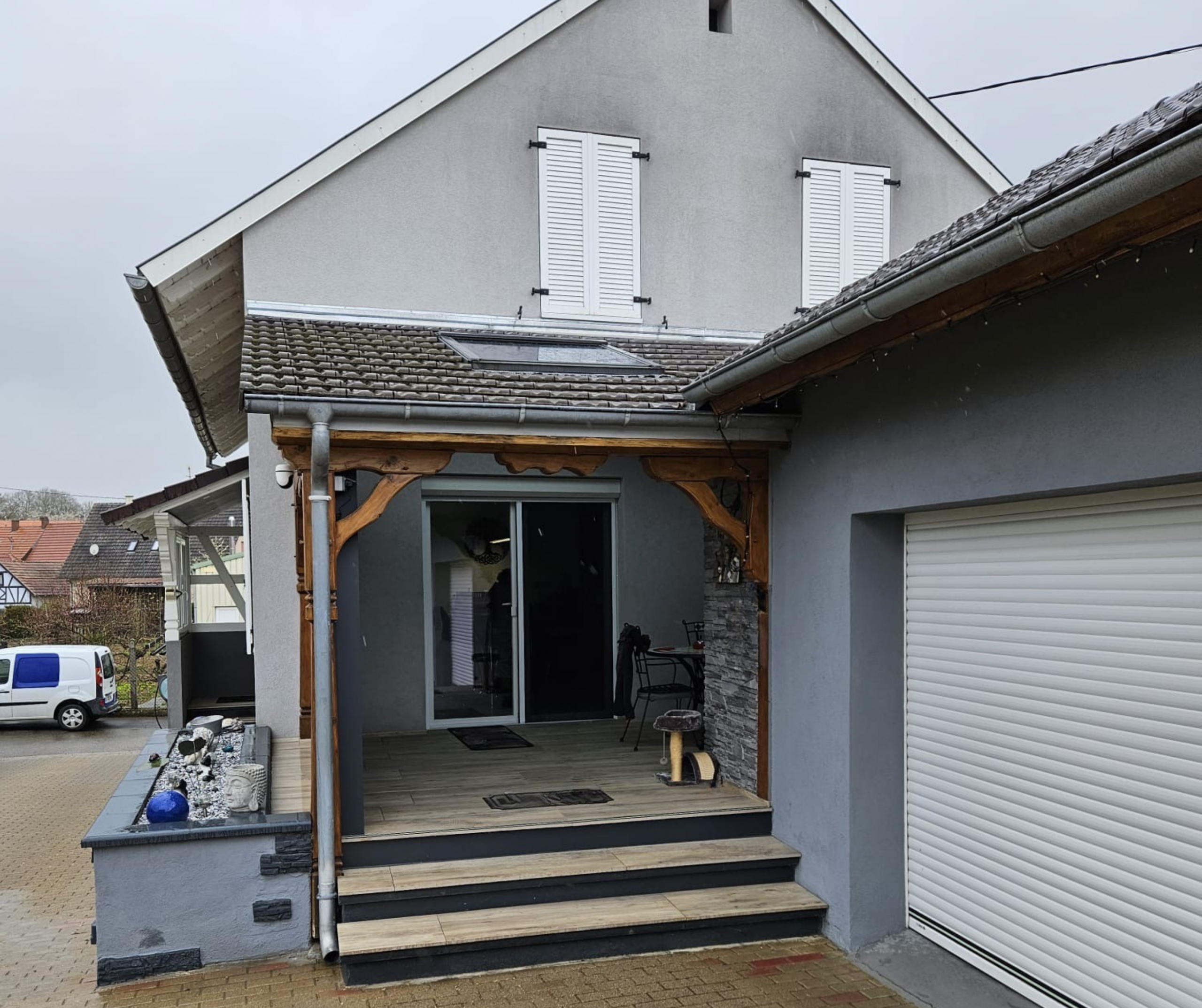 extension d’une terrasse couverte.