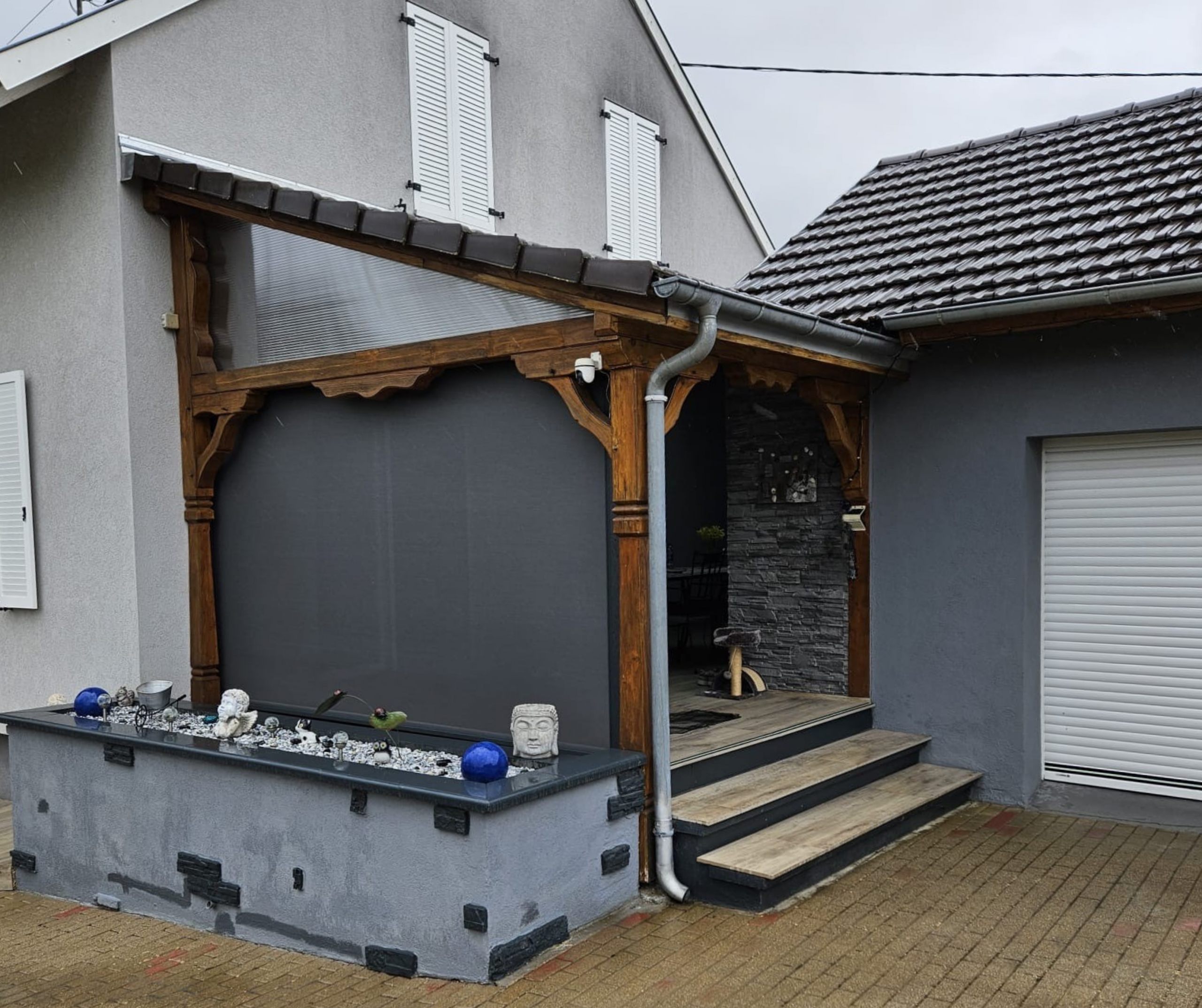 extension d’une terrasse couverte.